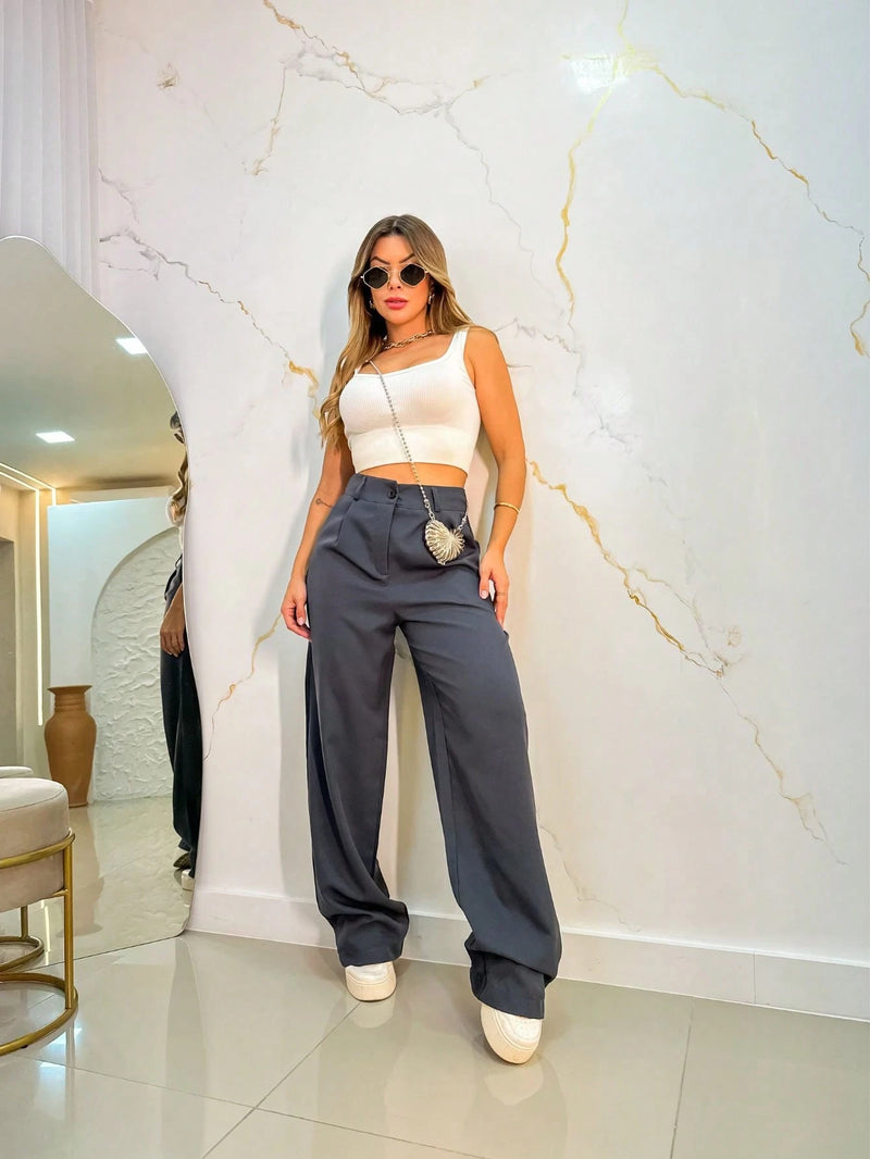Vendedor Indicado
calca pantalona feminina alfataria com uma botoes e ziper aberto