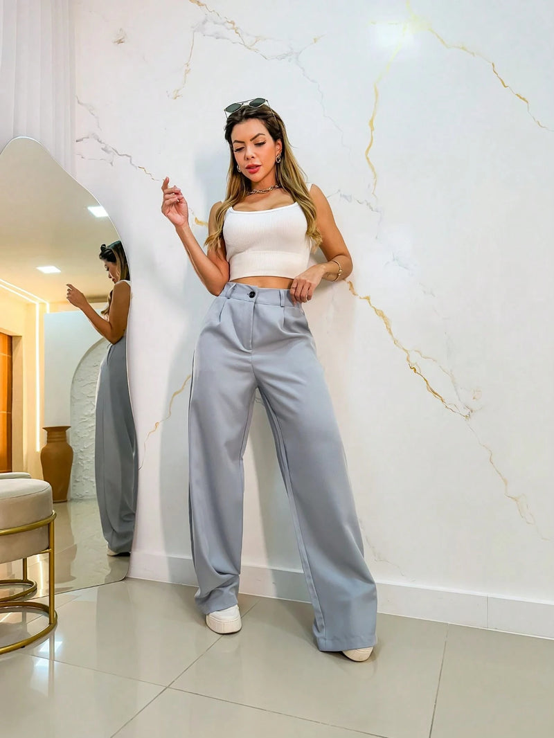 Vendedor Indicado
calca pantalona feminina alfataria com uma botoes e ziper aberto