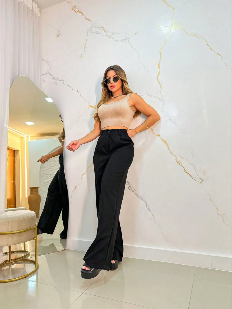 Vendedor Indicado
calca pantalona feminina alfataria com uma botoes e ziper aberto