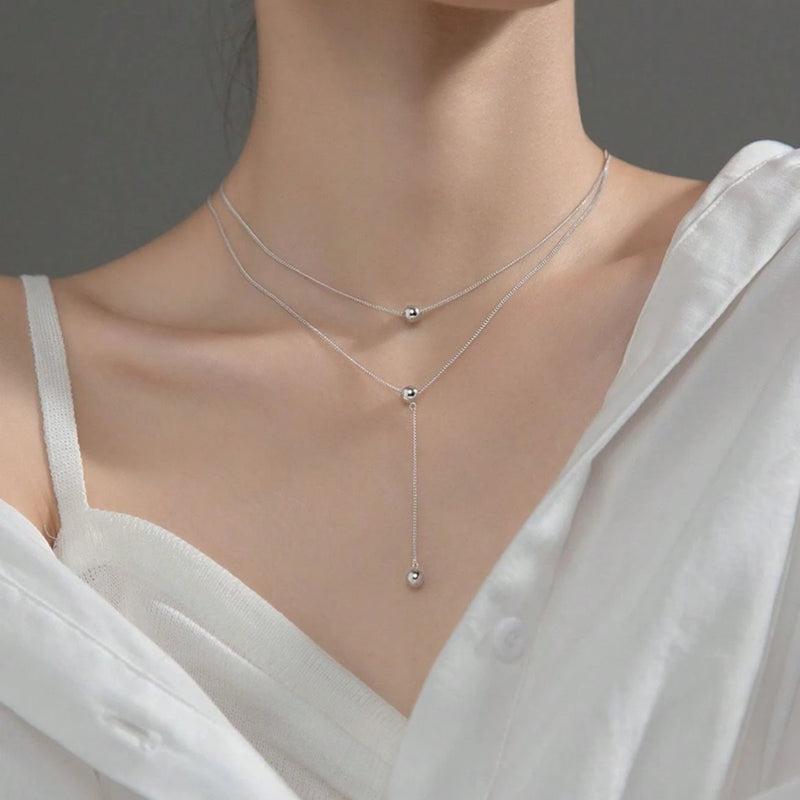 Vendedor Indicado
colar Aço titânio colar de camada dupla de nicho feminino high-end design sentido pequena cadeia de clavícula de contas 2023 novos acessórios simples da moda