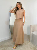 Vendedor IndicadoConjunto longo de linho, composto por saia com fenda e blusa com detalhes nas alças