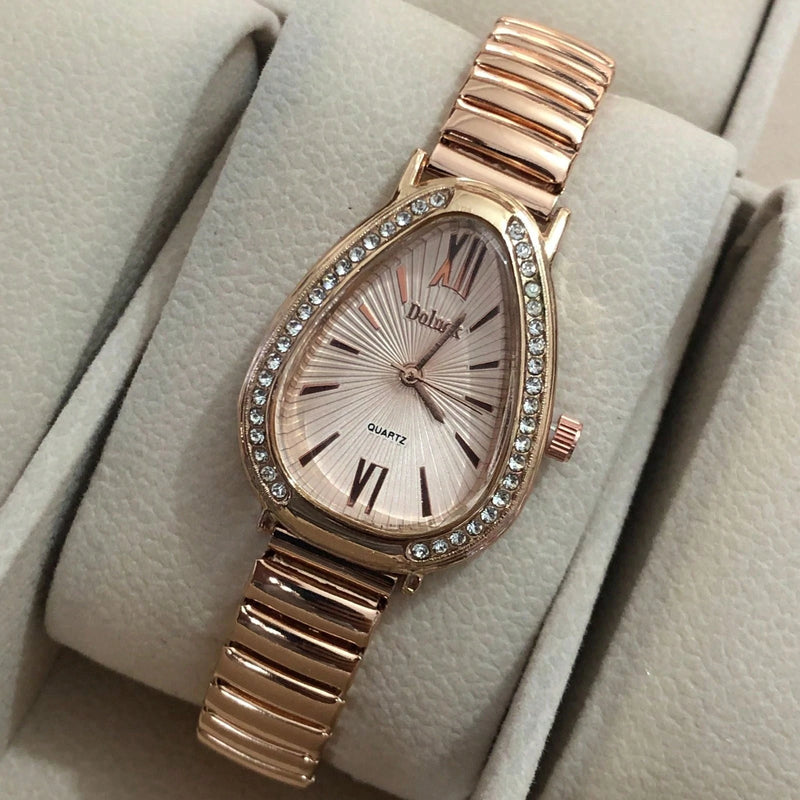 Relógio de Pulso Feminino Pulseira Elástica e plástico. Analógico Prata Rosas de ouro